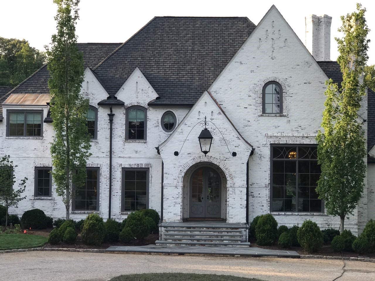 Rombaio lime washed brick home